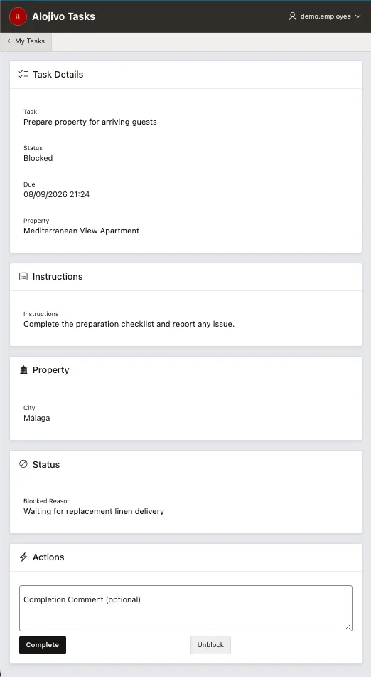 Alojivo employee web app on a phone showing a task with its status, due date, property, instructions, city, blocked reason and a Complete button.